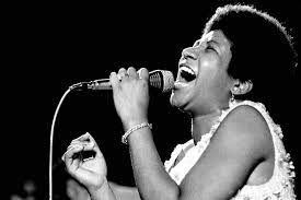 Aretha Franklin signing