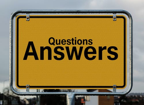 Road sign reads: Questions Answers