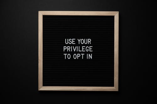 sign reads: Use your privilege to opt in.